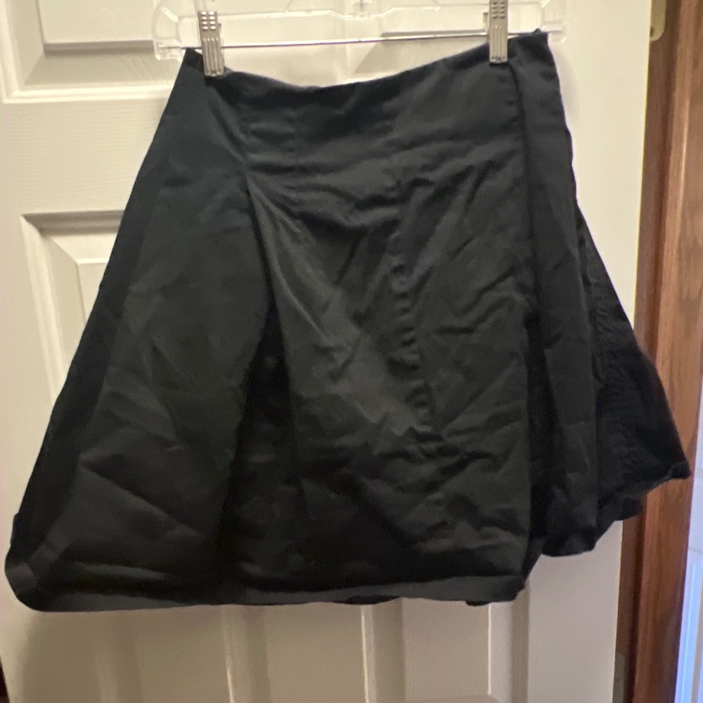 Black pleaded skirt